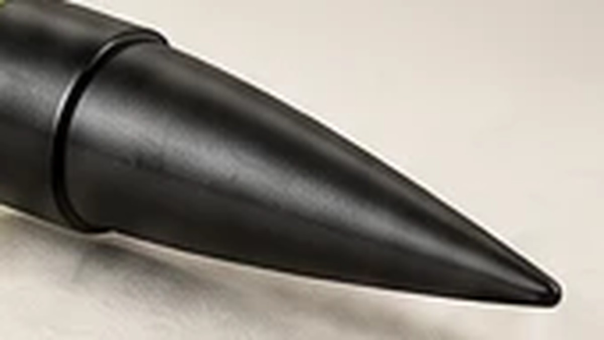 The black pointed ground tip on the end of the shaft